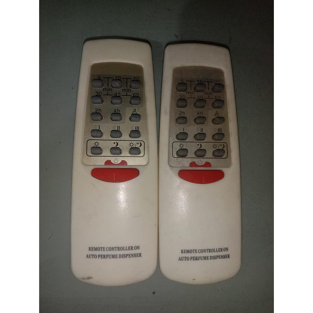 Remot Controller On Auto Perfume Dispenser 